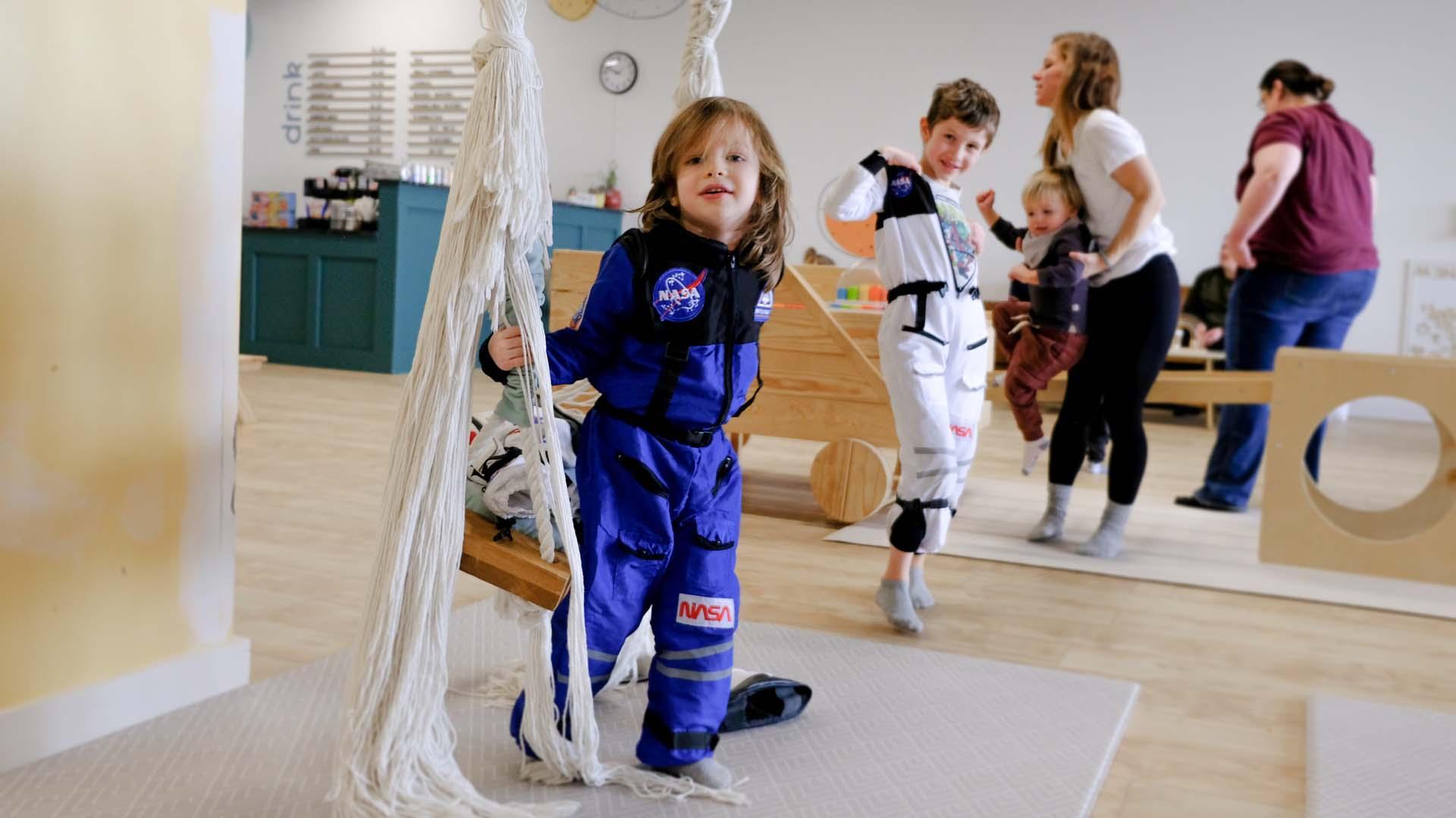 Kids playing at Little Things Play Cafe.
