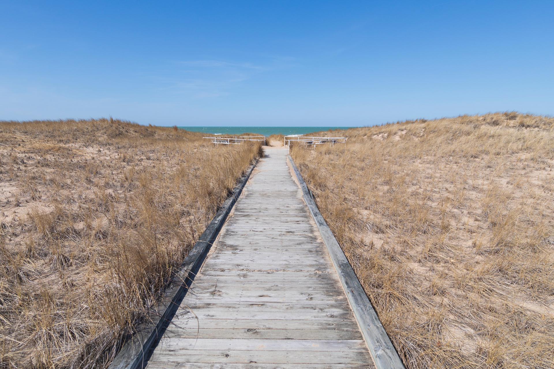 A boardwalk in springtime at Jean Klock in Benton Harbor