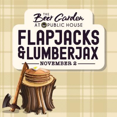 axe sitting next to tree with pancakes on the stump