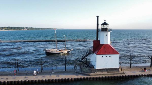 Tall Ship MJ sailing by the St. Joseph Lighthouse