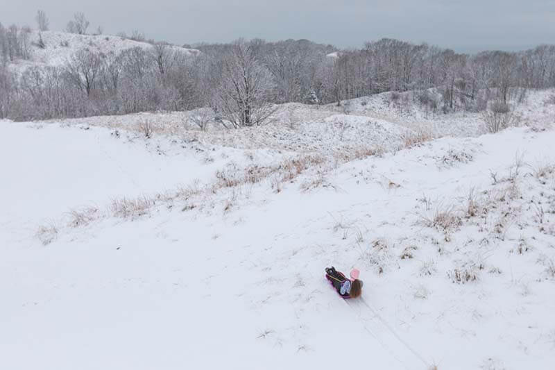 Sledding at Warren Dunes