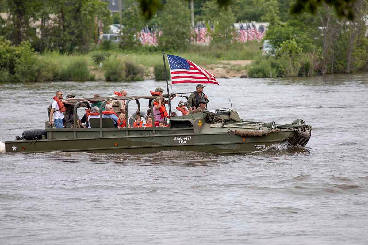 Veterans on a military boat parading Veterans on a military boat parading on the st. joseph river